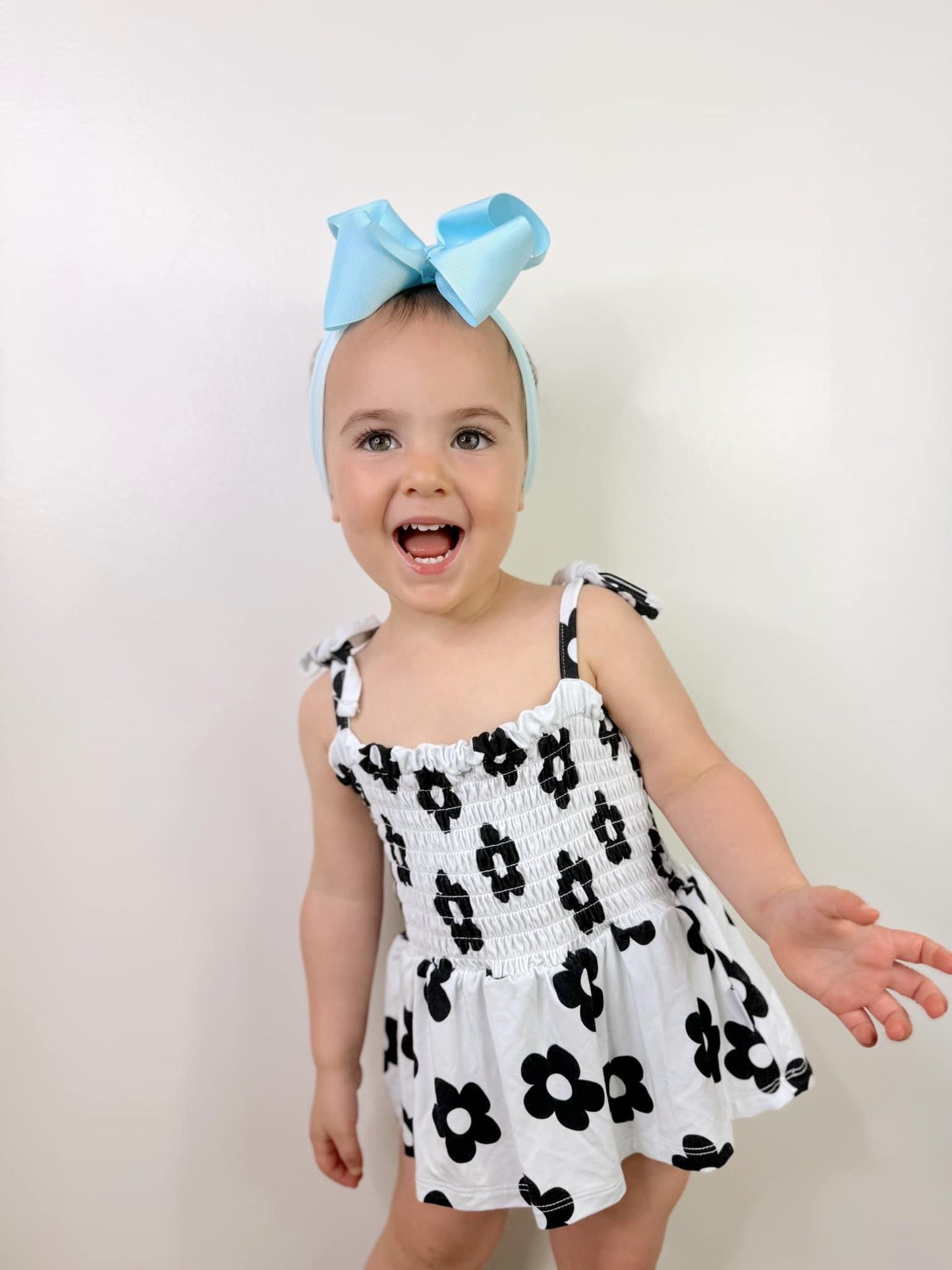 Black Daisy Smocked Romper